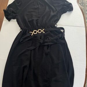 Elegant Black Dress with Gold Accents